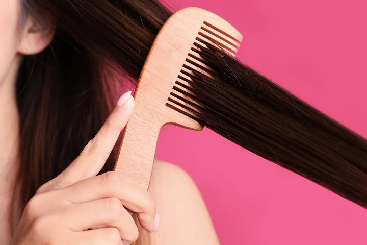 4. Use a wide-tooth comb when drying your hair